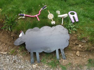 While rooting through skips and dumps I turned up a couple of little girls bikes and started to rethink my plan A. Considering I live in a house of women I decided to get in touch with my feminine side. Here the raw materials.
